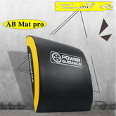 Black and yellow ergonomic ab mat with curved design and textured material for core workouts