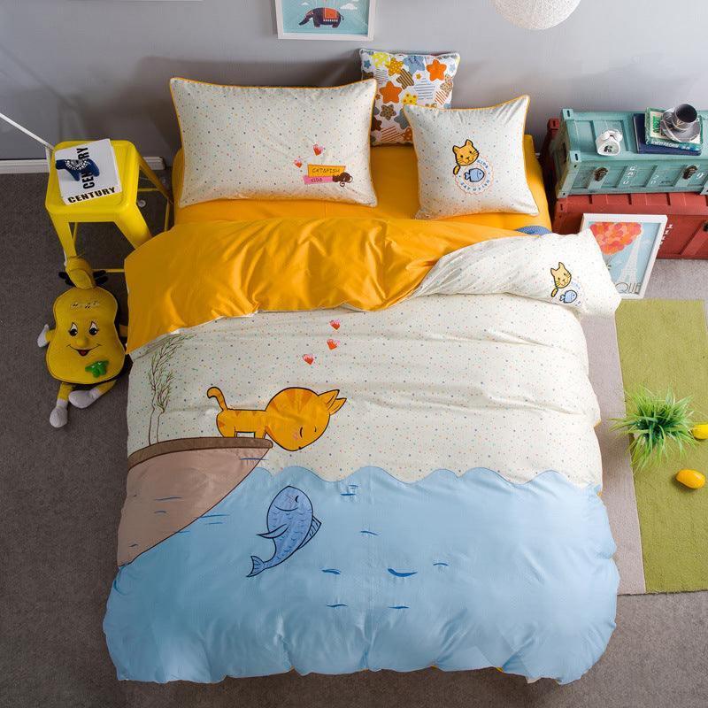 Yellow and cream cartoon cat and fish print bedding set with colorful accents, soft material, cozy fit