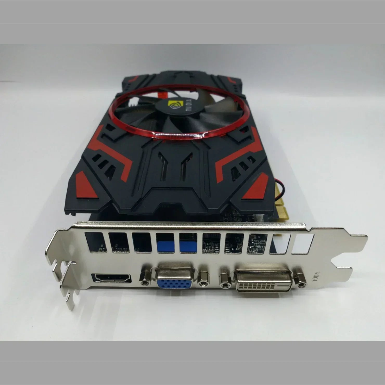Black and red graphics card with large fan, HDMI, VGA, and DVI ports, plastic casing.