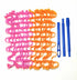Pink and orange flexible wave-shaped hair curlers with blue plastic styling tools