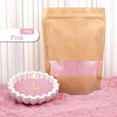 Pink decorative sand in kraft bag and bowl for candle display, modern home decor