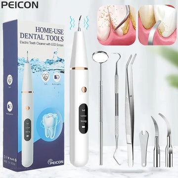 Electric dental cleaning kit with stainless steel tools and LED display on white background