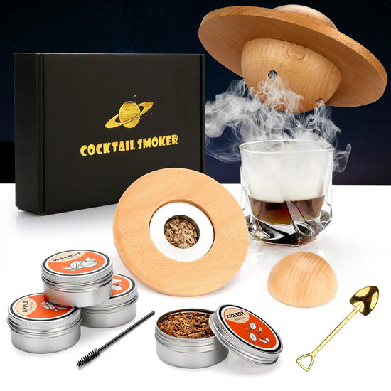 Cocktail smoking kit with wooden smoker lid, glass of smoked drink, wood chips, and accessories