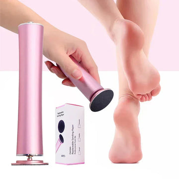 Pink electric foot callus remover used on bare feet with replaceable sanding pads