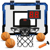 Mini basketball hoop set with digital scoreboard, three orange basketballs, and pump