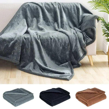 Soft fleece throw blanket in gray, black, and brown, cozy fit for modern home decor.