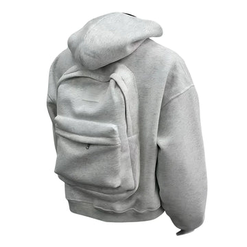 Light grey oversized hoodie with matching fabric backpack, soft texture, relaxed fit