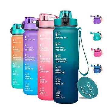 Four gradient-colored motivational water bottles with time markers, wide mouth, and flip-top lids.