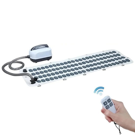 White and gray bubble bath massage mat with remote control for relaxing bath experience
