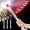 Pink and clear plastic water gun with heart-shaped handle, spraying water against colorful background