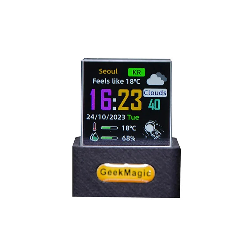 Compact desktop digital clock with color display showing time, weather, temperature, and humidity