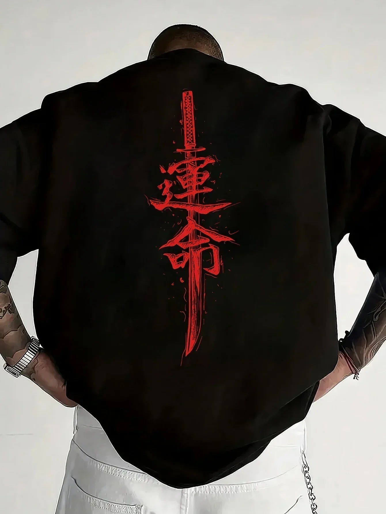 Oversized black streetwear jacket with bold red katana and kanji graphic on back