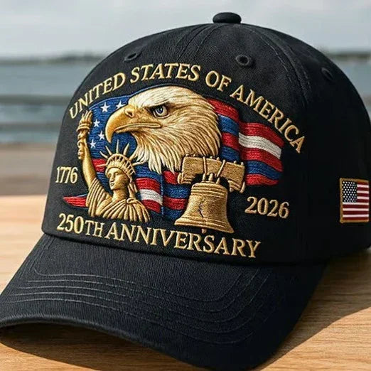 Black embroidered baseball cap with eagle, Statue of Liberty, flag, and 250th anniversary motifs.
