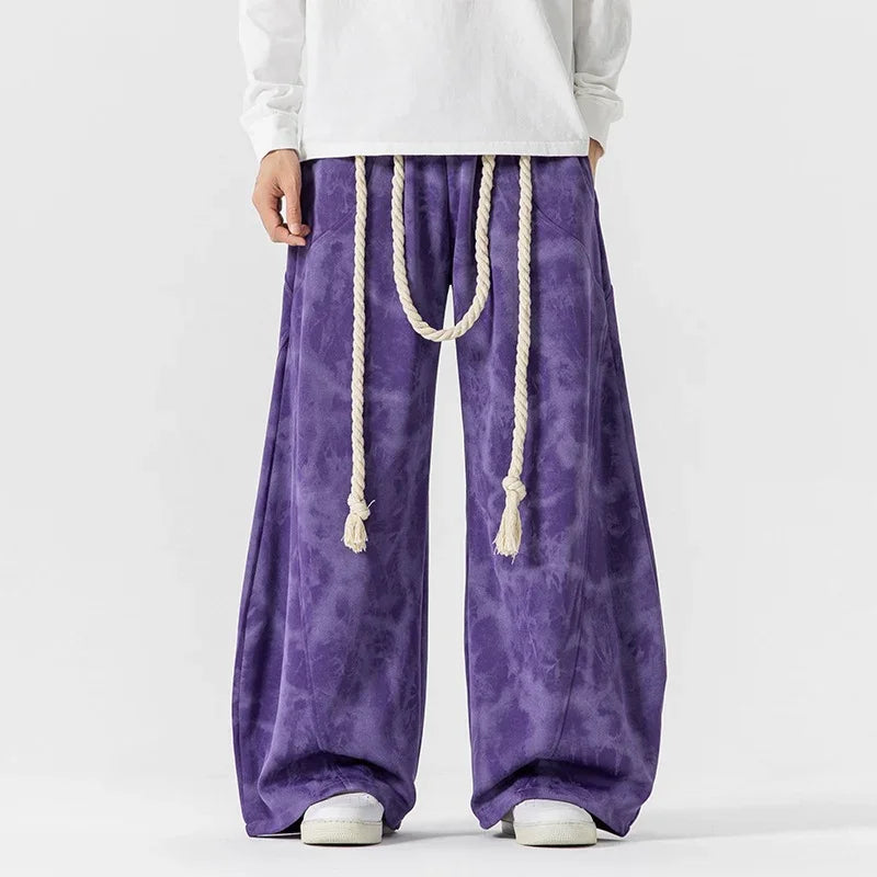 Purple tie-dye wide-leg pants with rope belt, relaxed fit streetwear style