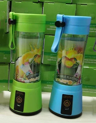 Green and blue portable electric blenders with clear plastic bodies and touch power buttons