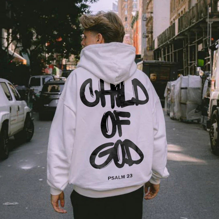 White oversized hoodie with bold black graffiti text, street style, relaxed fit.