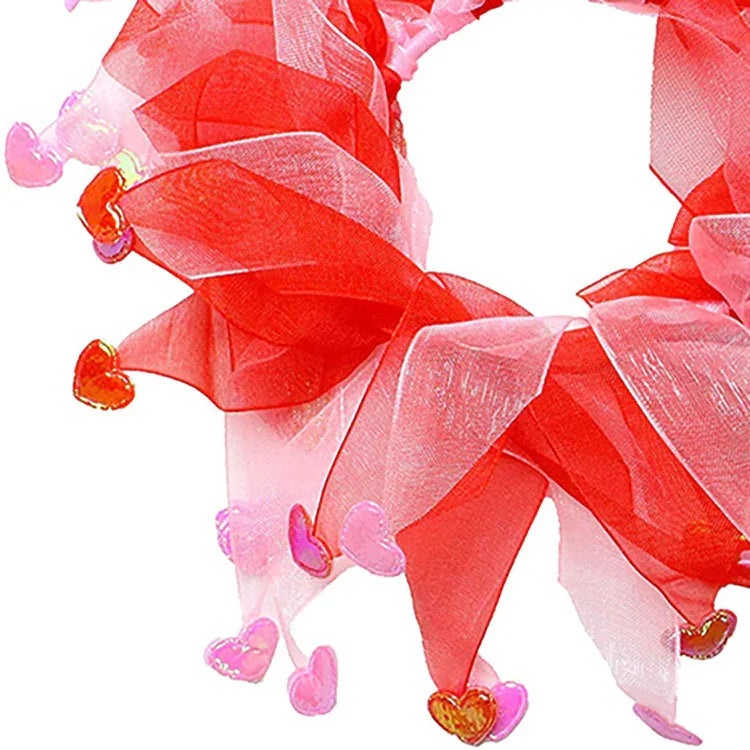 Red and pink sheer mesh scarf with small pink and orange heart accents, lightweight material