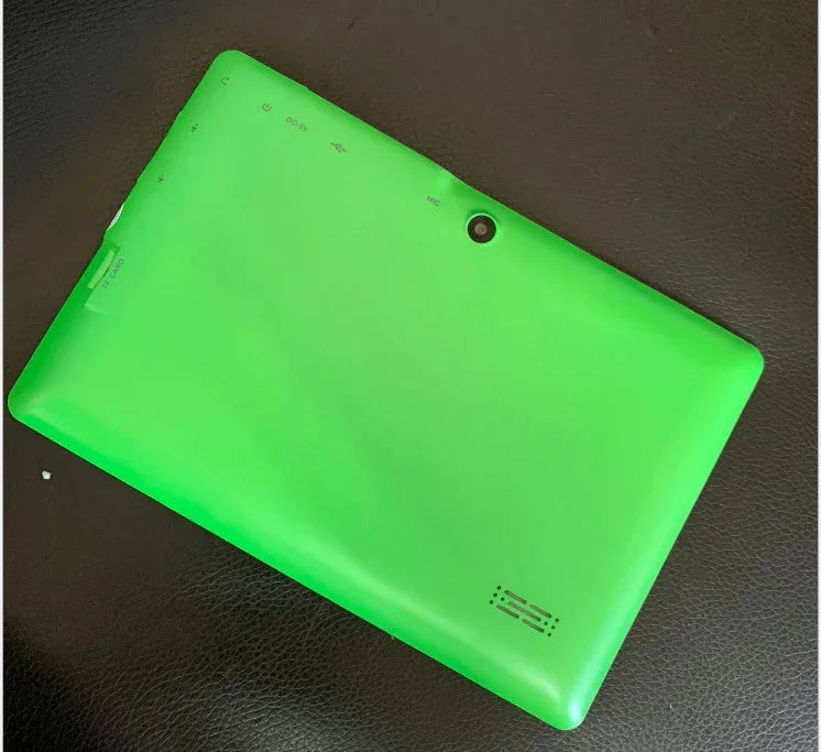 Back view of a bright green tablet with matte finish and rear camera, on dark surface
