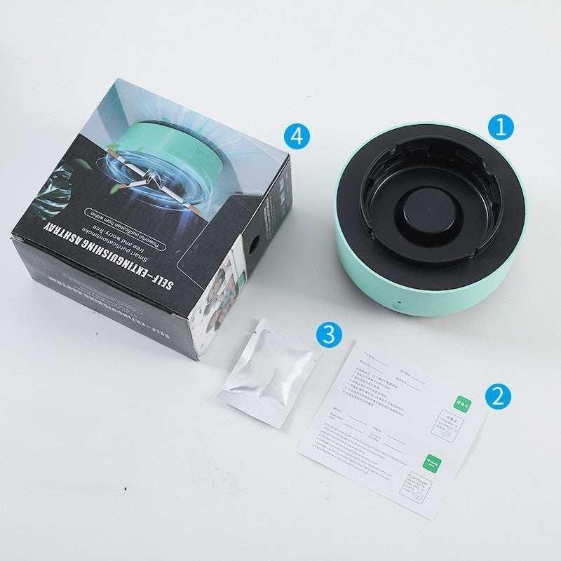 Self-extinguishing ashtray in mint green with matte finish, round shape, includes packaging and instructions.