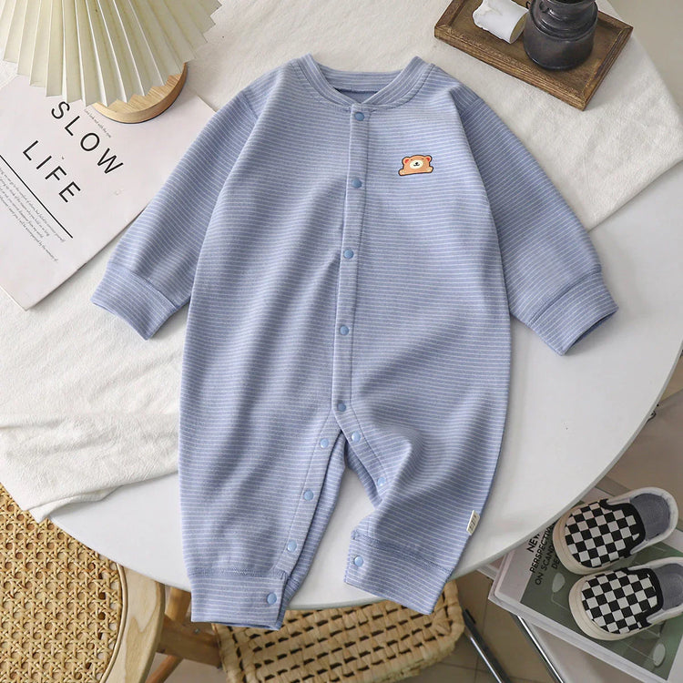 Light blue striped baby romper with long sleeves, snap buttons, and soft cotton material.