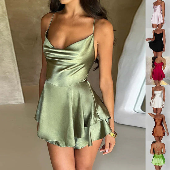 Satin mini dress with spaghetti straps, cowl neckline, and flared skirt in green, available in various colors.