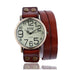 Vintage-style quartz watch with large dial, brown leather wrap strap, and metal rivets.