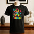 Black crewneck t-shirt with colorful puzzle ribbon, handprints, and &
