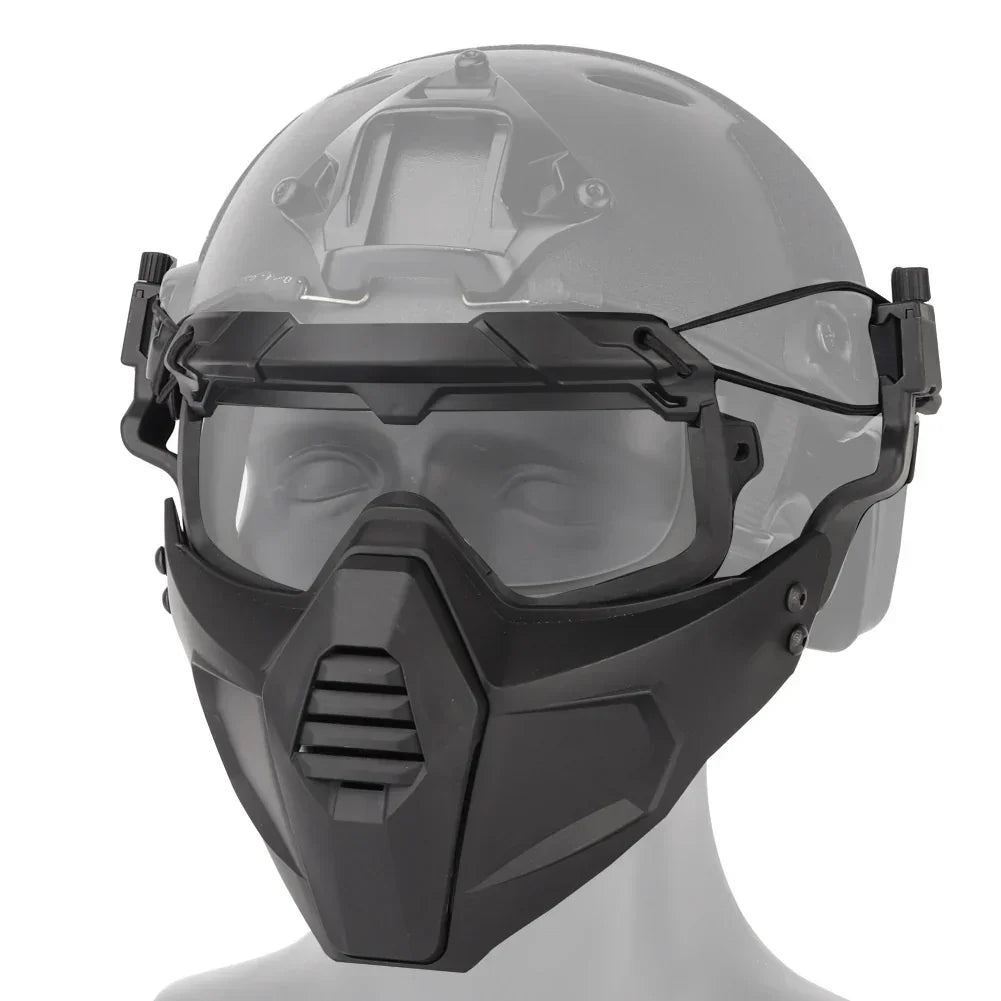Futuristic black tactical mask with clear visor and angular design, worn over a helmet