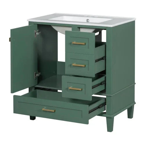 Green bathroom vanity cabinet with open drawers and doors, white countertop, modern hardware