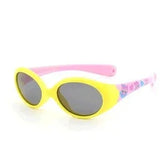 Oval sunglasses with yellow frame, pink arms, and black lenses, featuring a glossy finish.