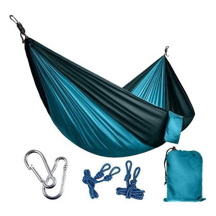 Lightweight teal and black nylon hammock set with carabiners, ropes, and carry bag