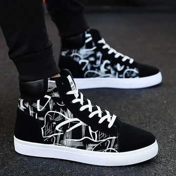Black and white high-top sneakers with abstract graphic pattern, lace-up streetwear style