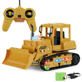 Yellow remote control bulldozer toy with LED lights, black tracks, and included controller