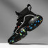Black high-top sneaker with mesh knit upper and chunky sole featuring bright multicolor splatter