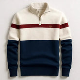 Colorblock pullover sweater with navy, cream, and red stripes, half zip, ribbed cuffs, relaxed fit