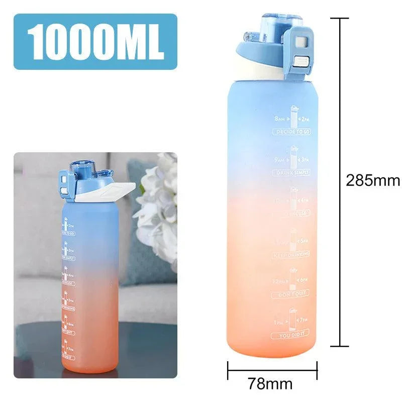 Gradient blue and orange 1000ml plastic water bottle with flip lid, motivational time marker, tall and slim design.