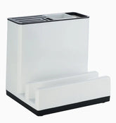 Modern white and black plastic desk organizer with multiple compartments and minimalist design