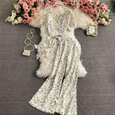 White floral print two-piece set with short sleeve top and wide leg pants, lightweight, relaxed fit