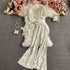 White floral print two-piece set with short sleeve top and wide leg pants, lightweight, relaxed fit