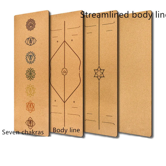 Set of four natural cork yoga mats displaying chakra symbols and alignment guide lines.