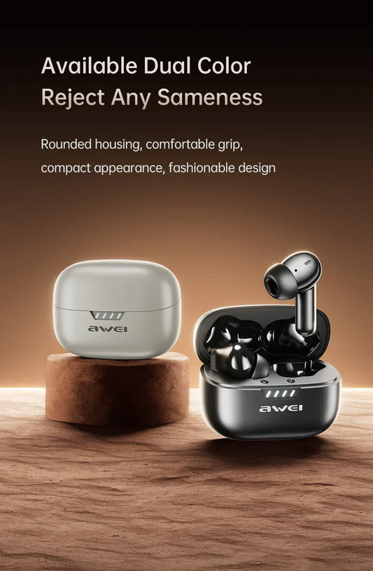 Black and silver true wireless earbuds with rounded, compact charging cases on a brown surface.