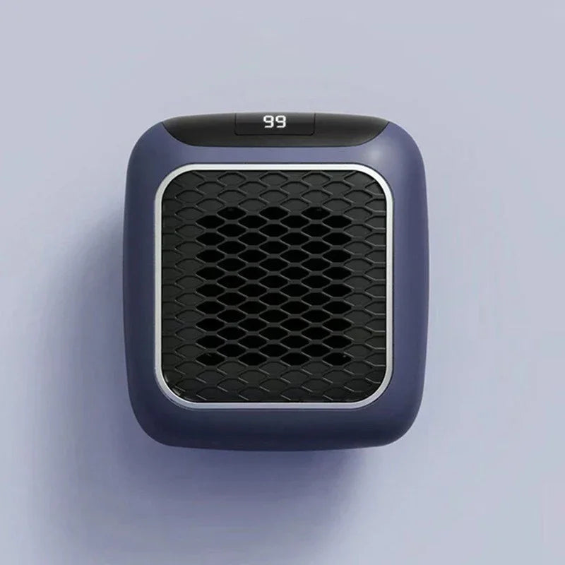 Compact dark gray portable heater with digital display and honeycomb vent design