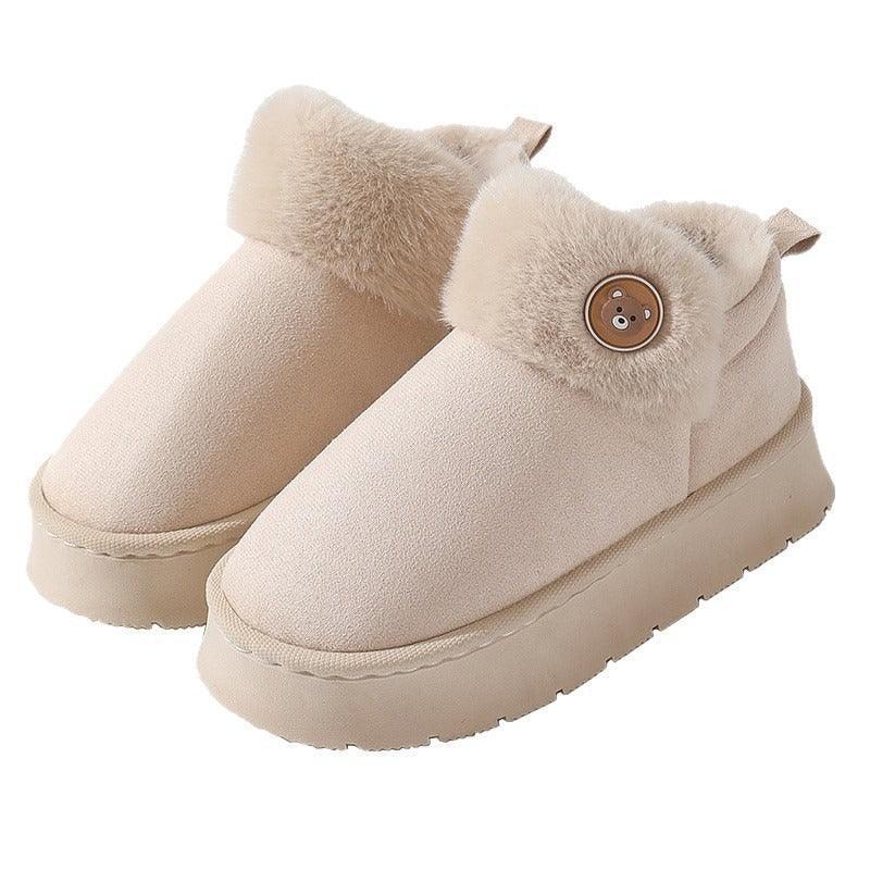 Beige suede slip-on slippers with plush faux fur lining, round toe, and button detail