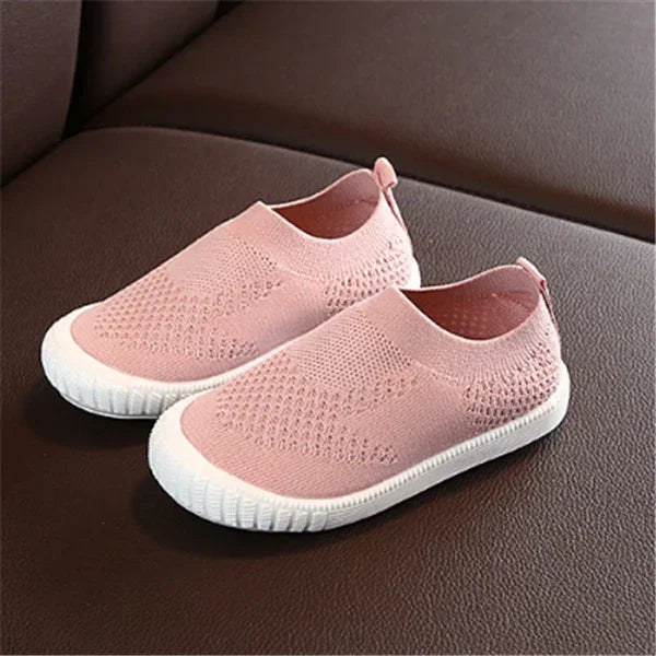 Light pink slip-on knit sneakers with white soles, breathable mesh, casual fit