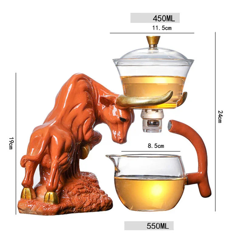 Decorative bull-shaped glass tea set with amber ceramic accents, contemporary design, transparent material, measured capacity shown.