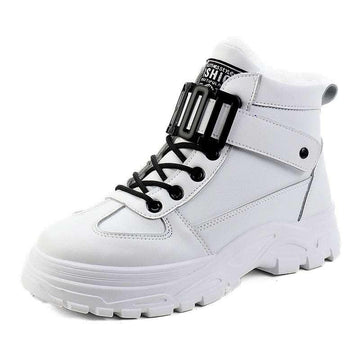 White chunky high-top sneaker with black laces, thick sole, and buckle strap detail
