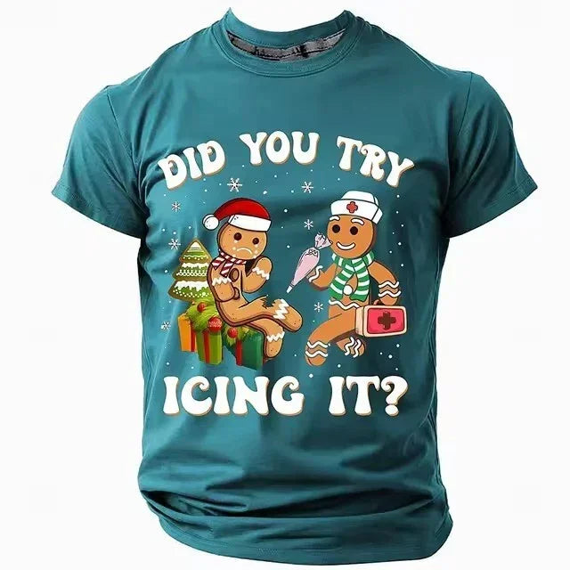 Teal graphic t-shirt with cartoon gingerbread characters and holiday humor design, relaxed fit