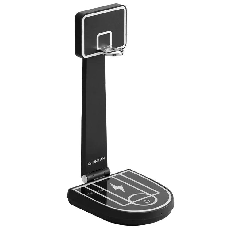Black foldable wireless charging stand with basketball hoop design and court graphic base