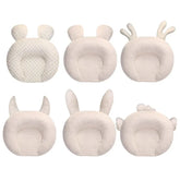 Six cream-colored plush cushions with animal ear shapes, soft fabric, round design