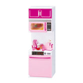 Miniature pink and white kitchen playset with microwave, cabinet, and accessories